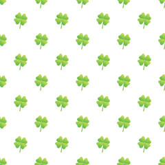Fototapeta premium Repeating four leaf clovers creating a continuous texture representing luck and st. Patrick's day