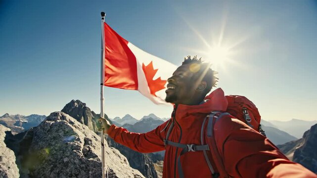 happy african man holding canadian flag on mountain peak. hiker with backpack celebrating success on summit. canada patriotism, national symbol. travel adventure, outdoor active lifestyle.