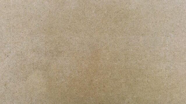 Beige textured paper background with subtle grain and warm tones, ideal for eco packaging mockups, product flatlay backdrops, rustic stationery presentations, and naturalbranding compositions. Soft