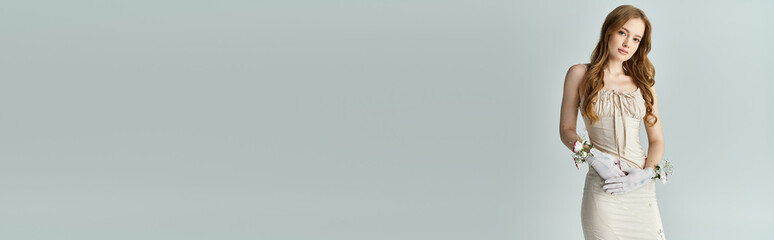 Fototapeta premium Spring fashion blooms with elegance as a young woman poses gracefully among flowers