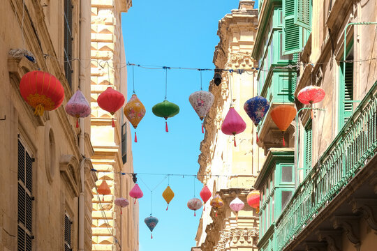 Valetta, Malta, Europe. Typical architecture of Valetta. Chinese lanterns hang from above,