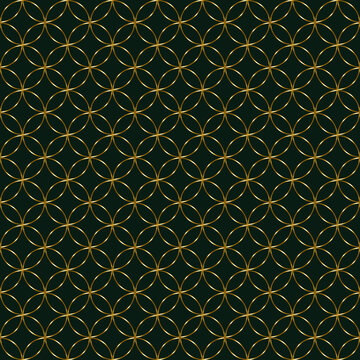 Seamless geometric pattern featuring interlocking gold circles arranged in a repeating grid on a deep emerald green background