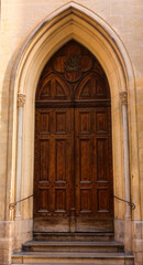 Fototapeta premium Gothic wooden arched door in Montpellier, France