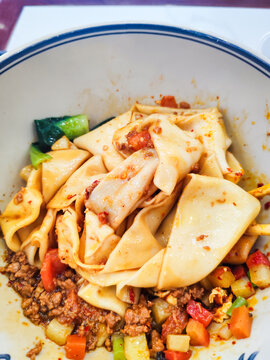 Biangbiang noodles in Xian, Shaanxi, China. Biang biang mian, Chinese Shaanxi cuisine served in Xian