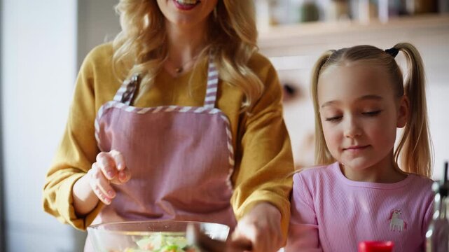 Little helper adding species enjoying time with mother at bright cuisine closeup