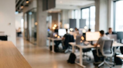 Fototapeta premium Blurred Modern Office Interior with Professionals at Desks