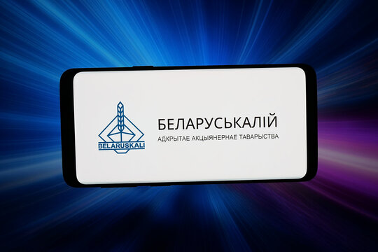 Stuttgart, Germany - 03-16-2026: In this photo illustration, the logo of potash fertilizer company JSC Belaruskali is displayed on a smartphone in front of abstract background on computer screen.