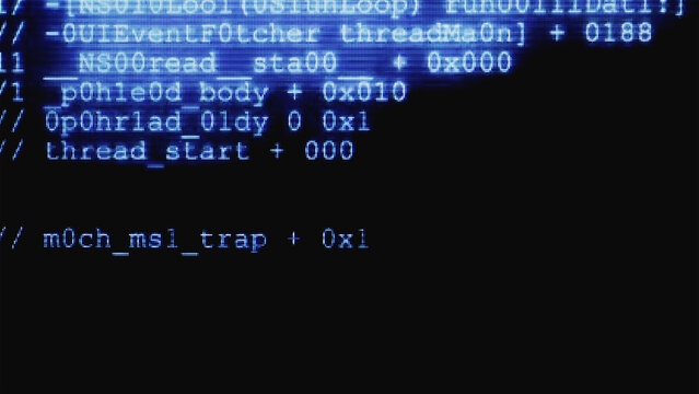 Hacker code on computer screen, suggesting programming, software development, cybersecurity and hacking; close-up pixelated terminal text and script evoke data, networks and digital technology.