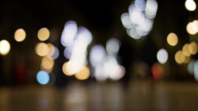 Blurred lights and crowds in city 
