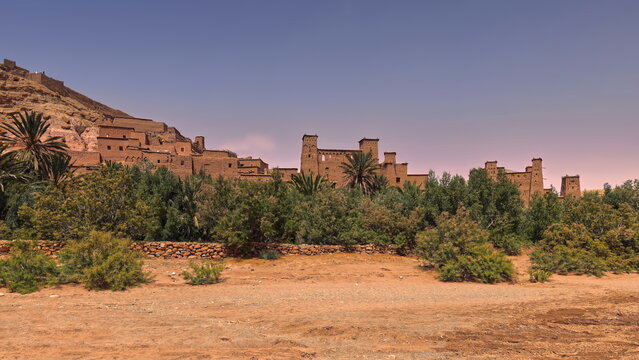A&iuml;t Benhaddou, historic ighrem or ksar (fortified walled village) next to the Asif Ounila River example of earthen clay architecture. Morocco-235