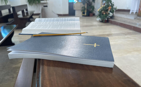 new testament on the bench in the Catholic chirch
