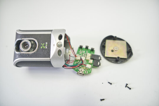 Suzano, Sao Paulo - Brazil - february 17, 2026: Complete disassembly of a USB webcam revealing its components