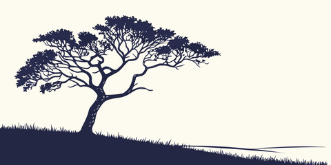 A solitary tree stands tall on a gentle hill under a clear sky. © Mamun