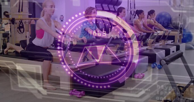 Five women kneeling pressing reformers camera panning purple HUD syncing numbers for pilates timing