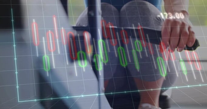 Woman initiating leg drive on fitness rowing machine, pulling handle and syncing candlestick chart