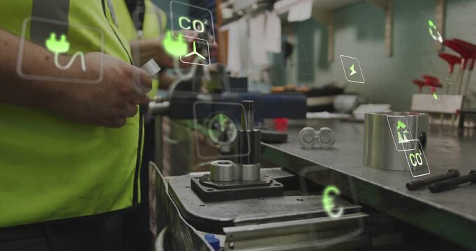 Tech reaching bench, grabbing tool, aligning shafts in fixture monitoring energy data with AR icons
