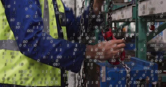 Worker pulling chain, aligning red hook, securing for plant rigging with binary overlaying hands