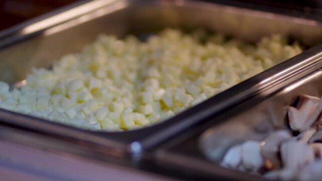 chopped Fresh vegetables, meat, chease in the refrigerator of the restaurant