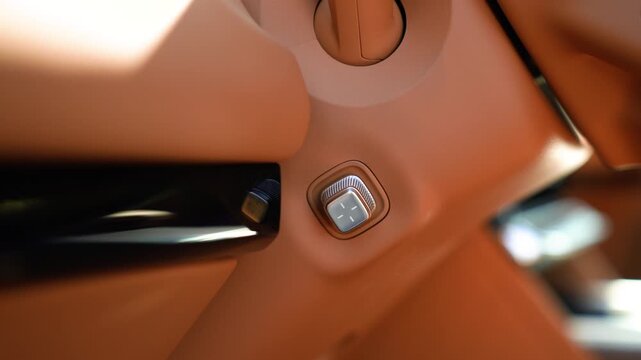 Metal steering wheel control lever in a car