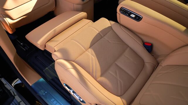 Spacious Brown Leather Interior in a Car with Massage