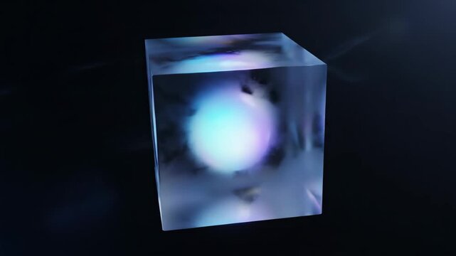 Glowing sphere rotating inside transparent crystal cube on dark background for science and technology intro
