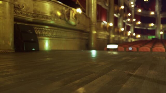 Empty wooden stage with warm lights, lowangle view of polished floor, blurred seating, string lights, brass details, cozy moody atmosphere perfect for music