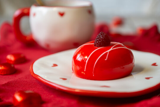 Valentine's Day on the table: strawberry cake, rose-shaped pancake cake and heart-shaped cake.