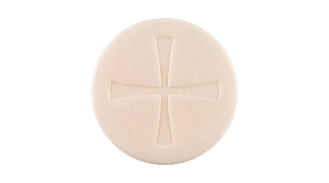 A holy communion wafer with a subtle cross design
