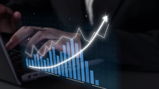 A close-up view of hands typing on a laptop, overlaid with a digital graph displaying trends and growth in finance, emphasizing analysis and progress in business sectors. Copula