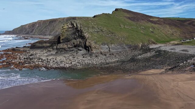 Drone flying out of Duckpool beach Cornwall