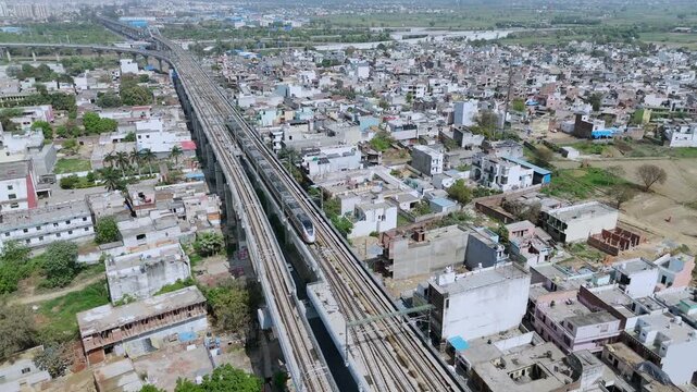 Aerial 4k view of RRTS Namo Bharat Train Running in Meerut, Uttar Pradesh, India