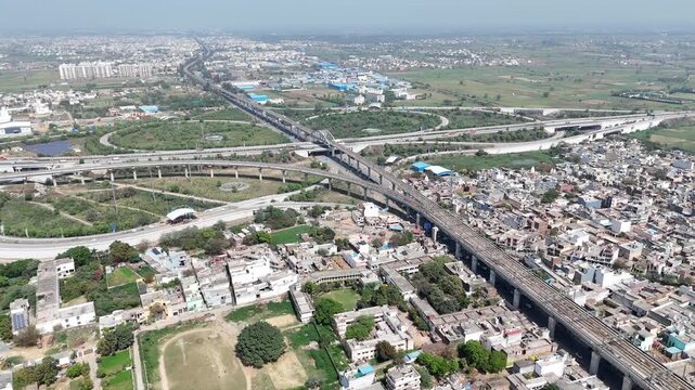 Aerial 4k view of RRTS Namo Bharat Train Running in Meerut, Uttar Pradesh, India
