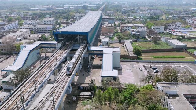 Aerial 4k view of RRTS Namo Bharat Train Running in Meerut, Uttar Pradesh, India