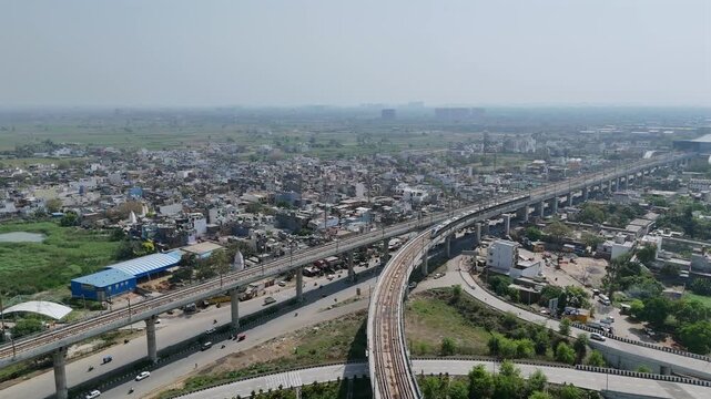 Aerial 4k view of RRTS Namo Bharat Train Running in Meerut, Uttar Pradesh, India