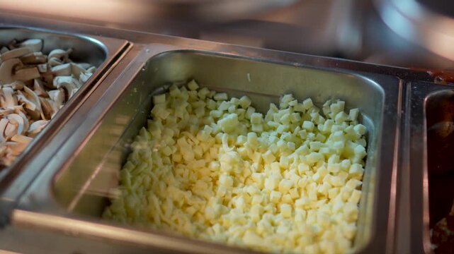 chopped Fresh vegetables, meat, chease in the refrigerator of the restaurant