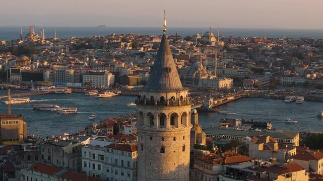 Cinematic aerial shot of Galata Tower at sunset in Istanbul, Turkey