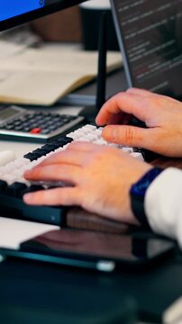 Software Developer Typing Keyboard Workspace, programmer hands, coding screen, mechanical keyboard, desktop setup, office desk, technology workflow, application development, digital occupation