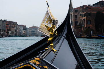 Canal with bridge in Venice, Italy, from the gondola © Ervin