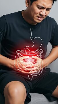 Man suffering from severe abdominal pain, highlighting the human digestive system, discomfort due to intestinal disease, internal organ inflammation, health problems