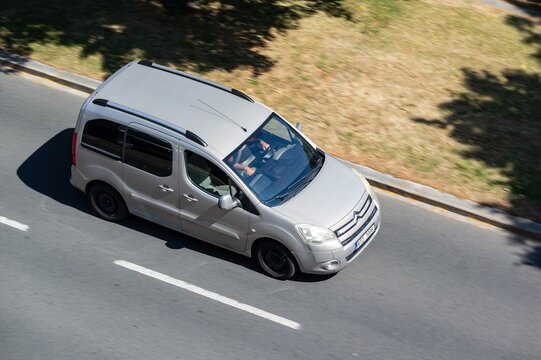 Grey Citroen Berlingo Multispace panel van car with motion blur effect