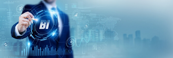 Analyst using a pen while analyzing data BI business intelligence and data visualization, analytics...