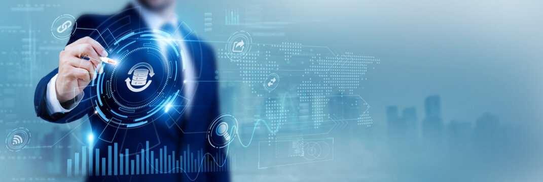 IT specialist using a pen while analyzing data Backup and data protection, cloud storage solutions, disaster recovery, secure archiving, information management, IT continuity