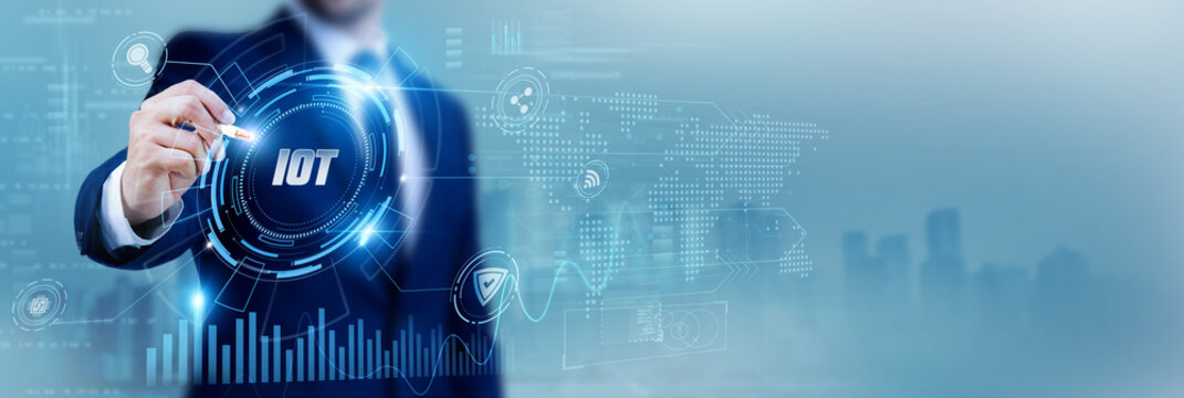 Engineer using a pen while analyzing data IoT and connected devices, smart systems, network integration, automation technology, real-time monitoring, digital solutions