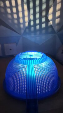 light passing through the plastic strainer