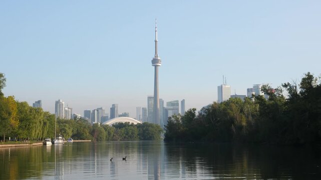 View of downtown Toronto and CN Tower from Toronto islands. 4K stock video. 