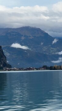 Panoramic view of Lake Thun and Lake Brienz in Switzerland with turquoise water, alpine mountains and scenic Bernese Oberland landscape near Interlaken, ideal for travel, nature and tourism themes