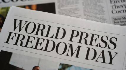 World press freedom day headline on newspaper showing importance of independent journalism and media communication