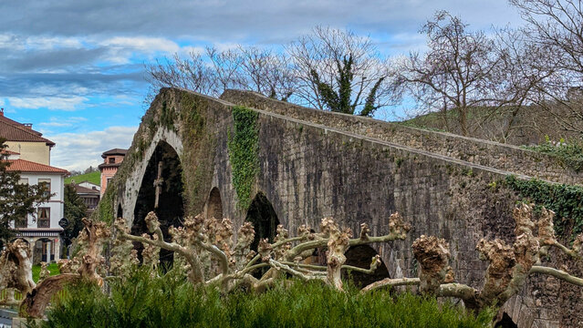 Old Roman stone bridge in Cangas de Onis over Sella river, Asturias, Spain