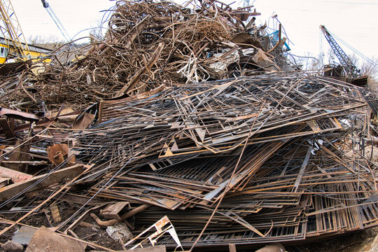 Steel waste from rebar close-up, scrap steel and other metal waste, preparation for recycling