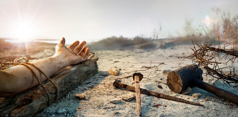 Naklejka na ściany i meble Crucifixion Of Jesus - Christ On Wooden Cross With Crown Of Thorns On Calvary Hill